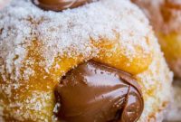 Nutella-Stuffed Donuts with Gooey Chocolate Hazelnut Filling