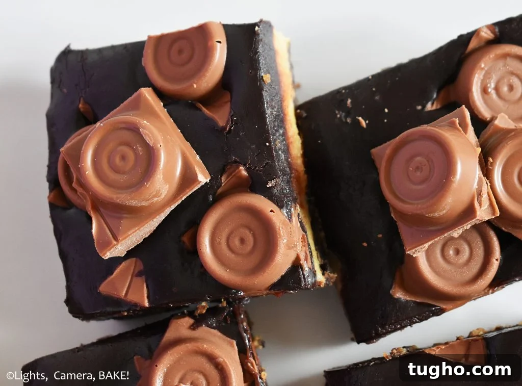 Rolo topped chocolate slice on a plate