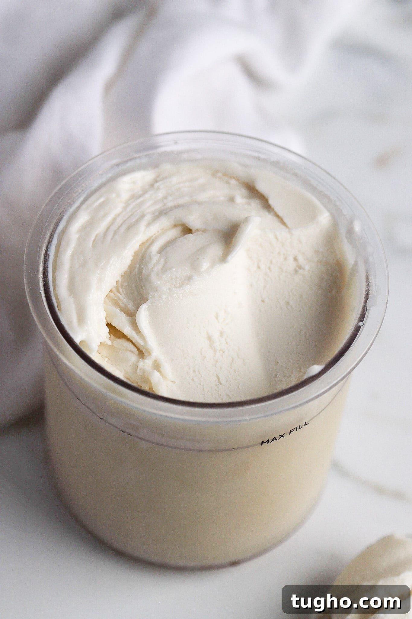 How to Make Vanilla Protein Ice Cream in a Ninja Creami 2 Ninja Creami vanilla protein ice cream in pint container