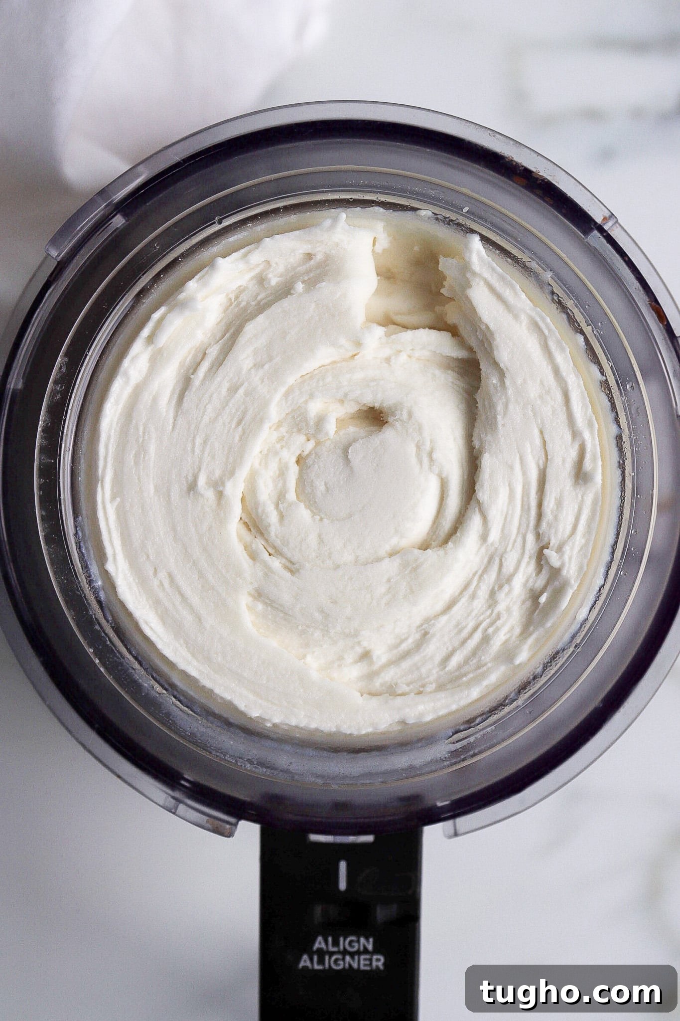 How to Make Vanilla Protein Ice Cream in a Ninja Creami 6 Top down view of easy dessert recipe in ninja creami pint.