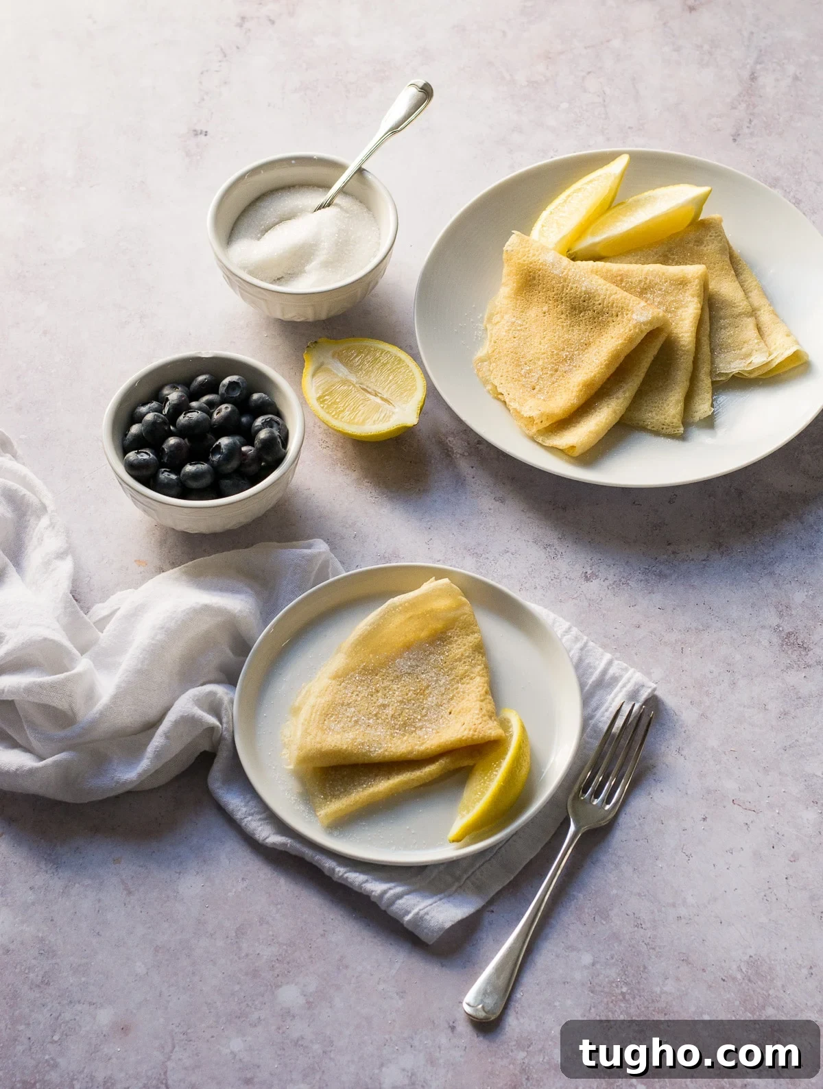 Easy Vegan Pancakes with sugar and lemon