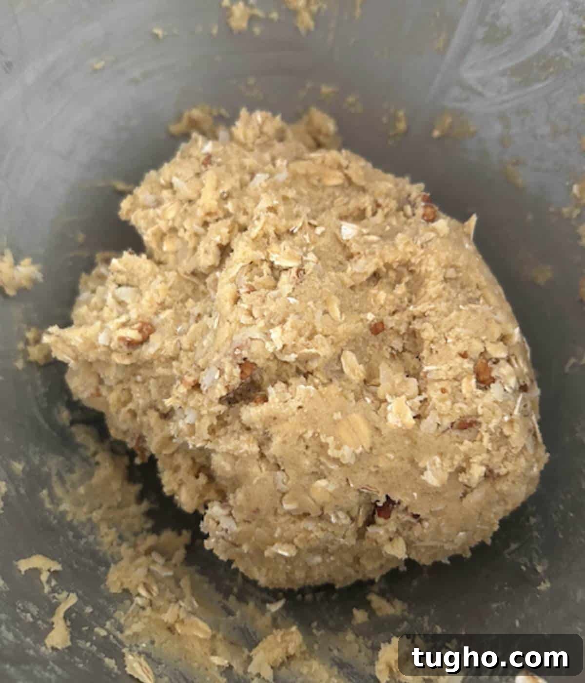 Cookie dough ball in bowl.