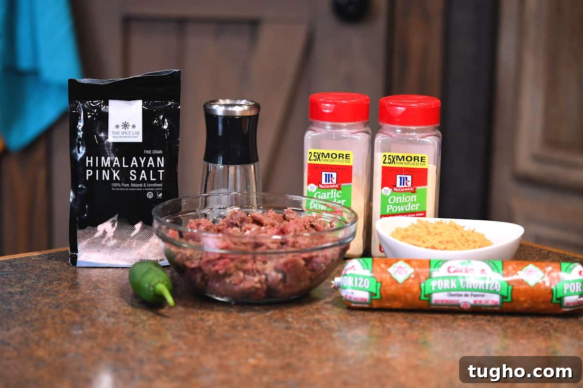 Venison Chorizo Burger with Cheddar and Jalapeno 3 ingredients for chorizo venison burger on a countertop