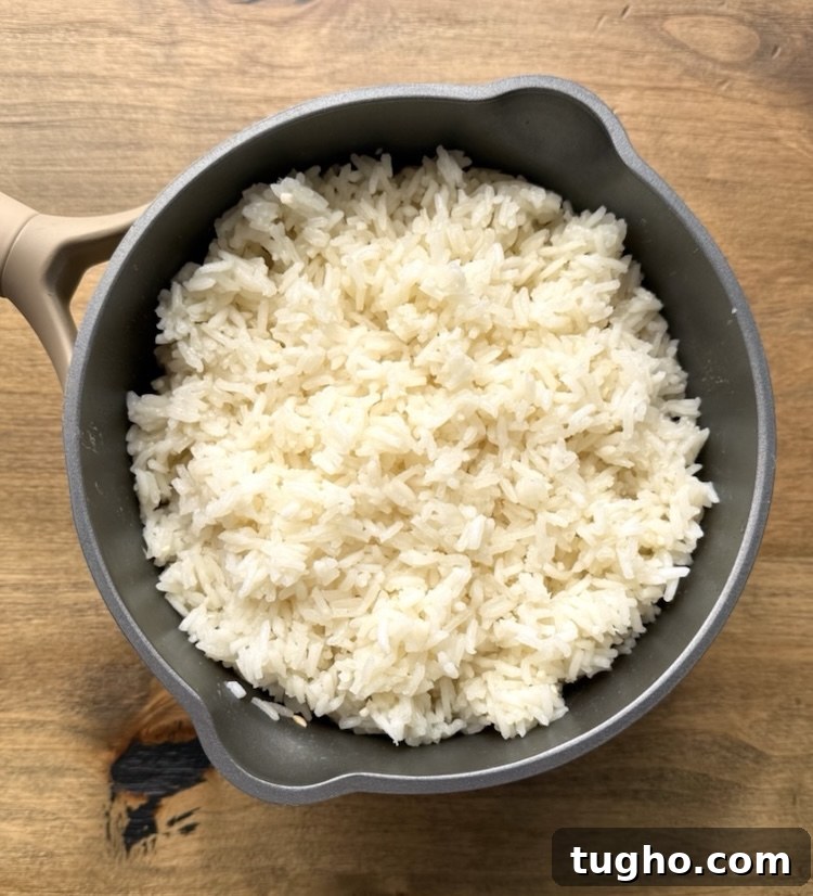 Beef and Pepper Rice Bowls 4 Fluffy white rice in a small pan ready to be served.
