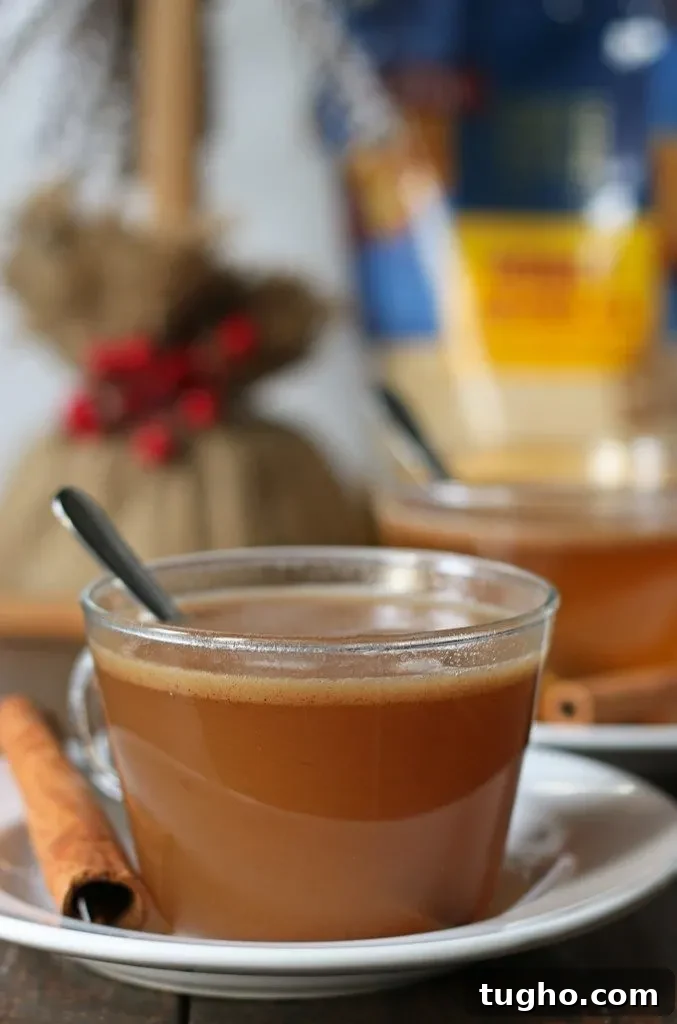 A cozy gathering around the fire with honey buttered rum