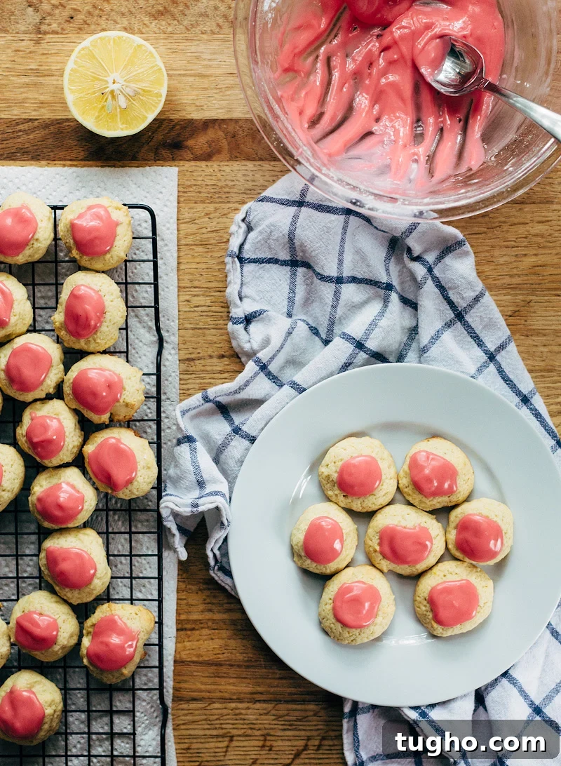 Zesty Lemon Buttermilk Cookies with Raspberry Glaze 6 topping lemon buttermilk cookies with raspberry glaze