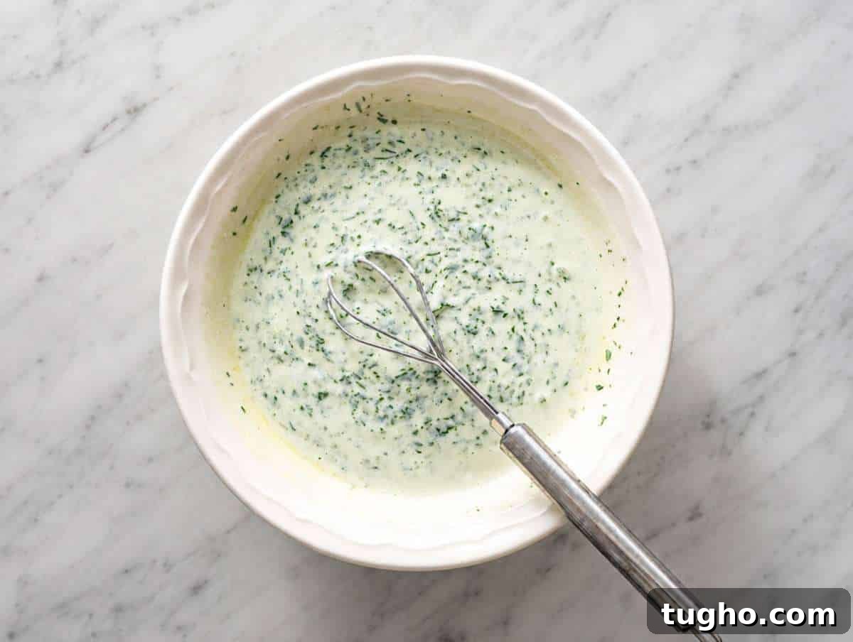 Step 2 Creamy cilantro lime dressing whisked in a small bowl.
