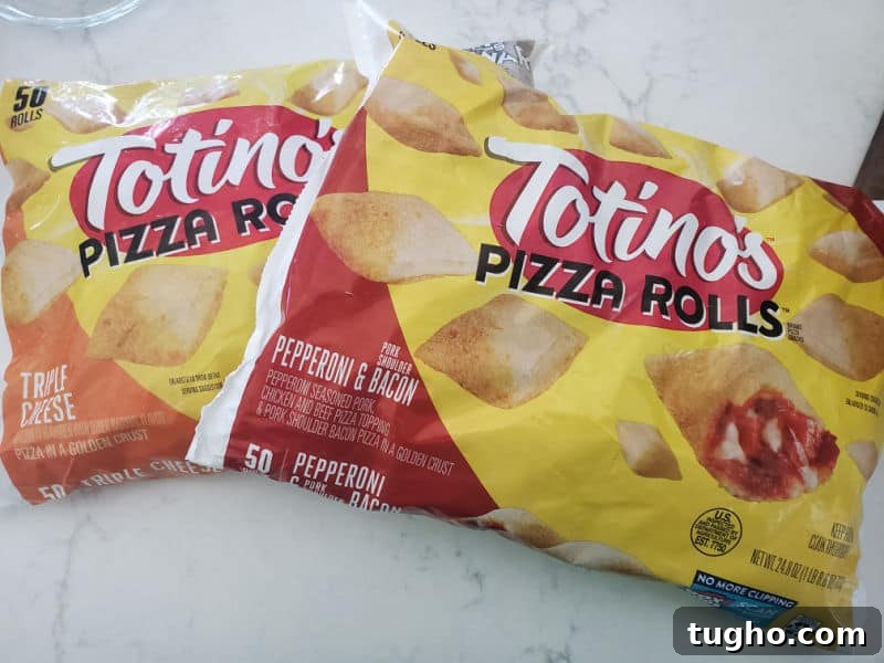 Crispy Air Fryer Pizza Rolls Recipe 3 2 bags of Totino's pizza rolls on a white counter