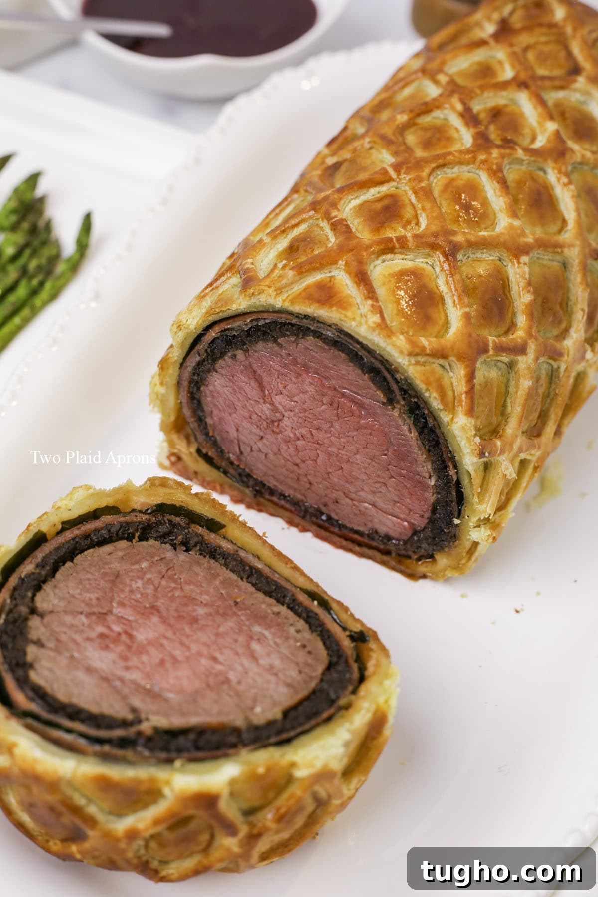 Classic Beef Wellington Recipe 2 Whole Beef Wellington on cutting board