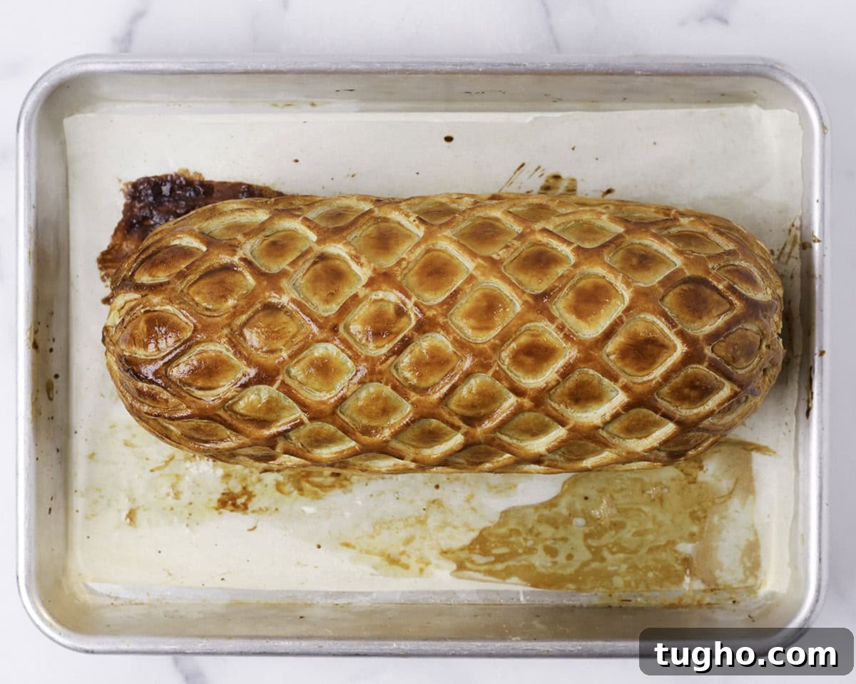 Classic Beef Wellington Recipe 9 Sliced Beef Wellington resting before serving