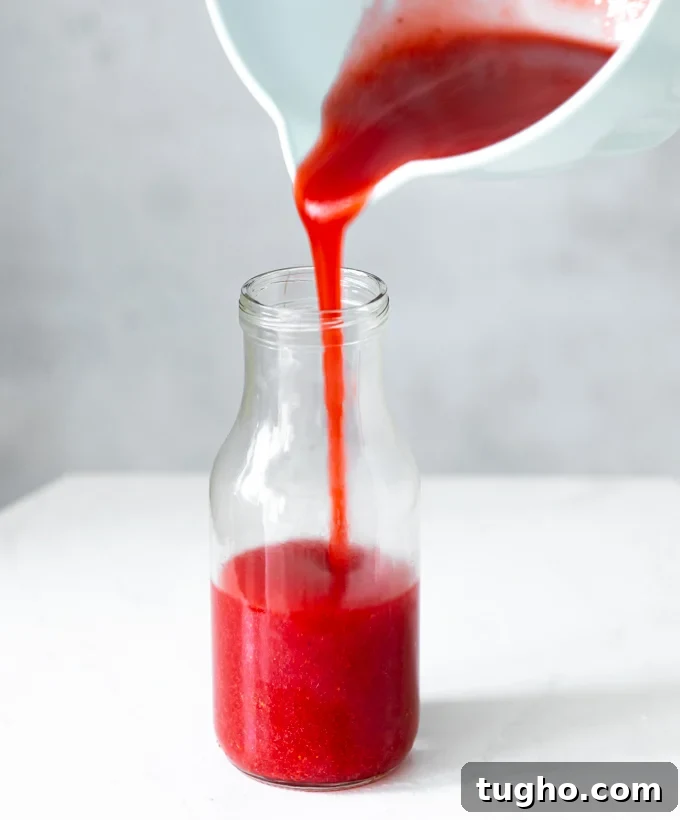 Homemade Strawberry Milk Recipe with Fresh Strawberries 8 A photo of delicious sweet homemade strawberry syrup