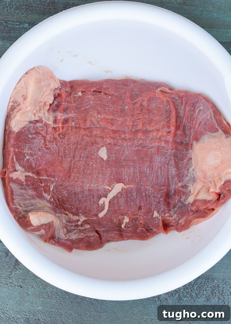 Juicy Marinated Flank Steak Recipe 5 Marinated flank steak ready to cook