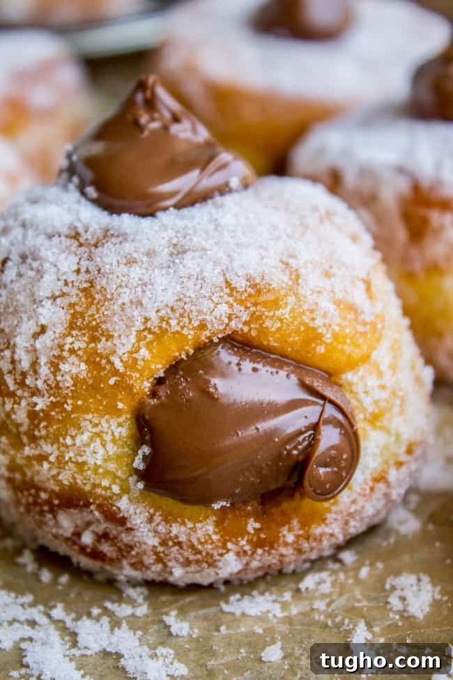 Nutella Filled Donut Recipe nutella donuts with filling spilling out