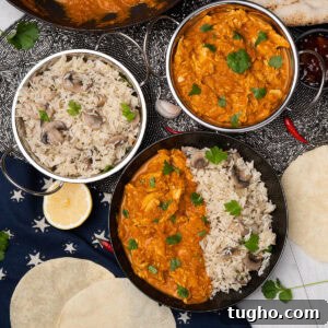 Leftover Turkey Curry and mushroom rice served in Balti dishes and a black bowl with coriander over the top with poppadoms round the bowl
