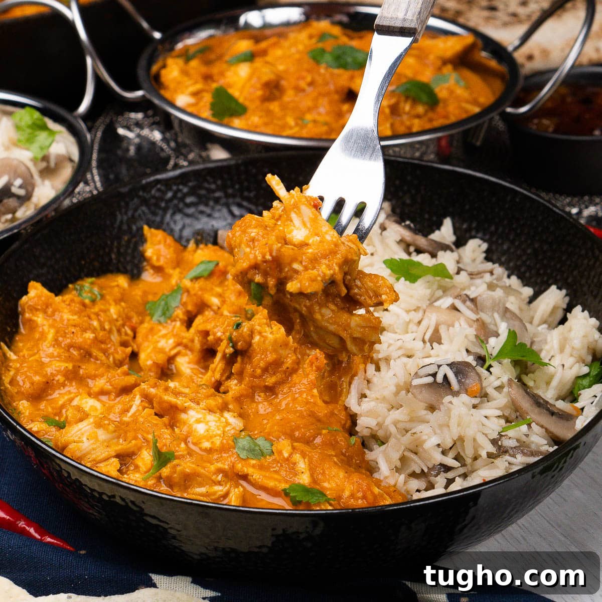 Leftover Turkey Curry with Coconut and Warm Spices 13 Turkey Curry being picked up with a fork