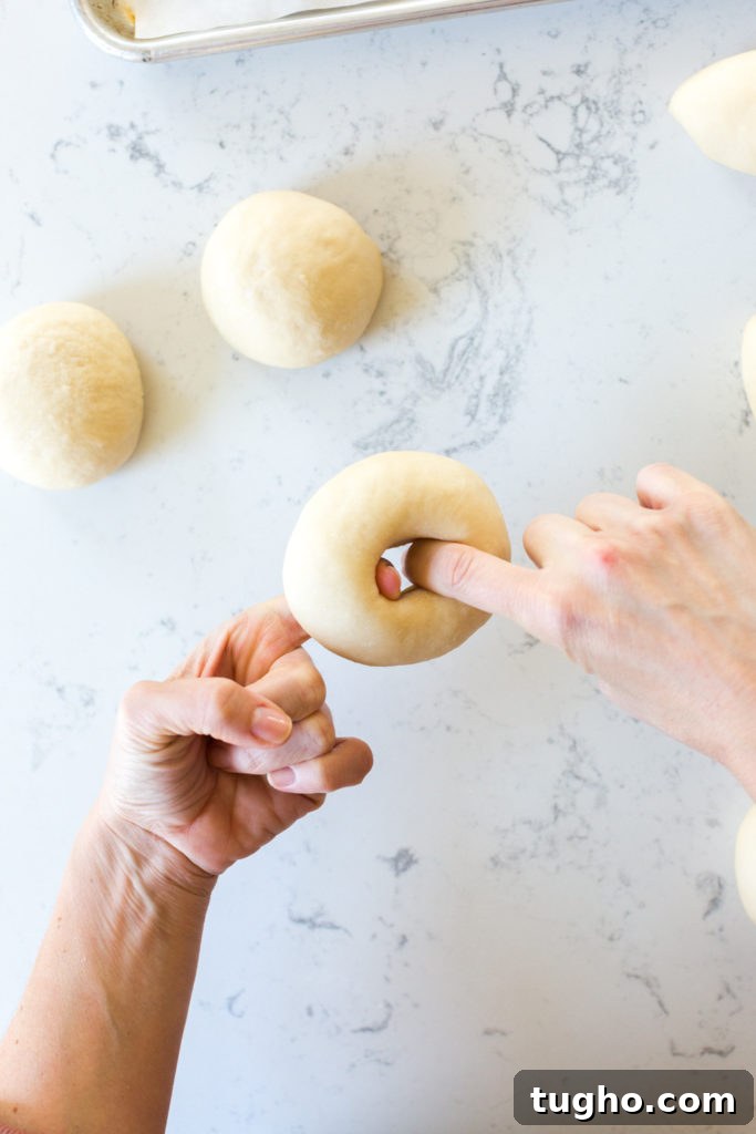 Stretching bagel dough