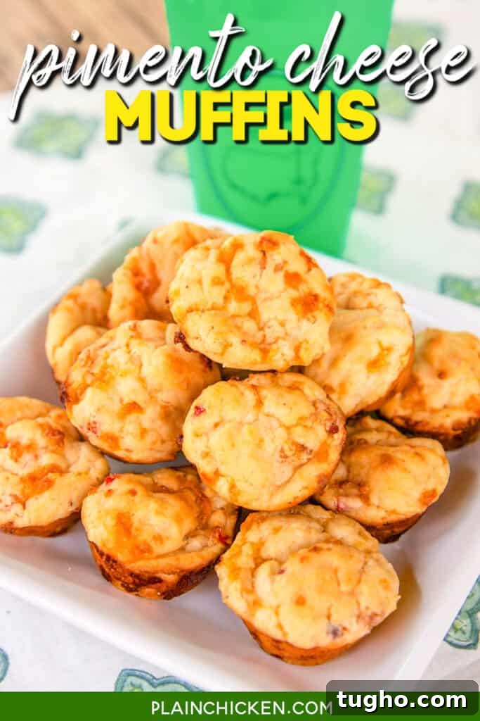 Pimento Cheese Muffins Recipe {The Masters} - pimento cheese baked into yummy muffins. Great as a snack, breakfast for with dinner. Bisquick, buttermilk, sugar and pimento cheese. Ready to eat in 10 minutes!! plate of pimento cheese biscuit muffins