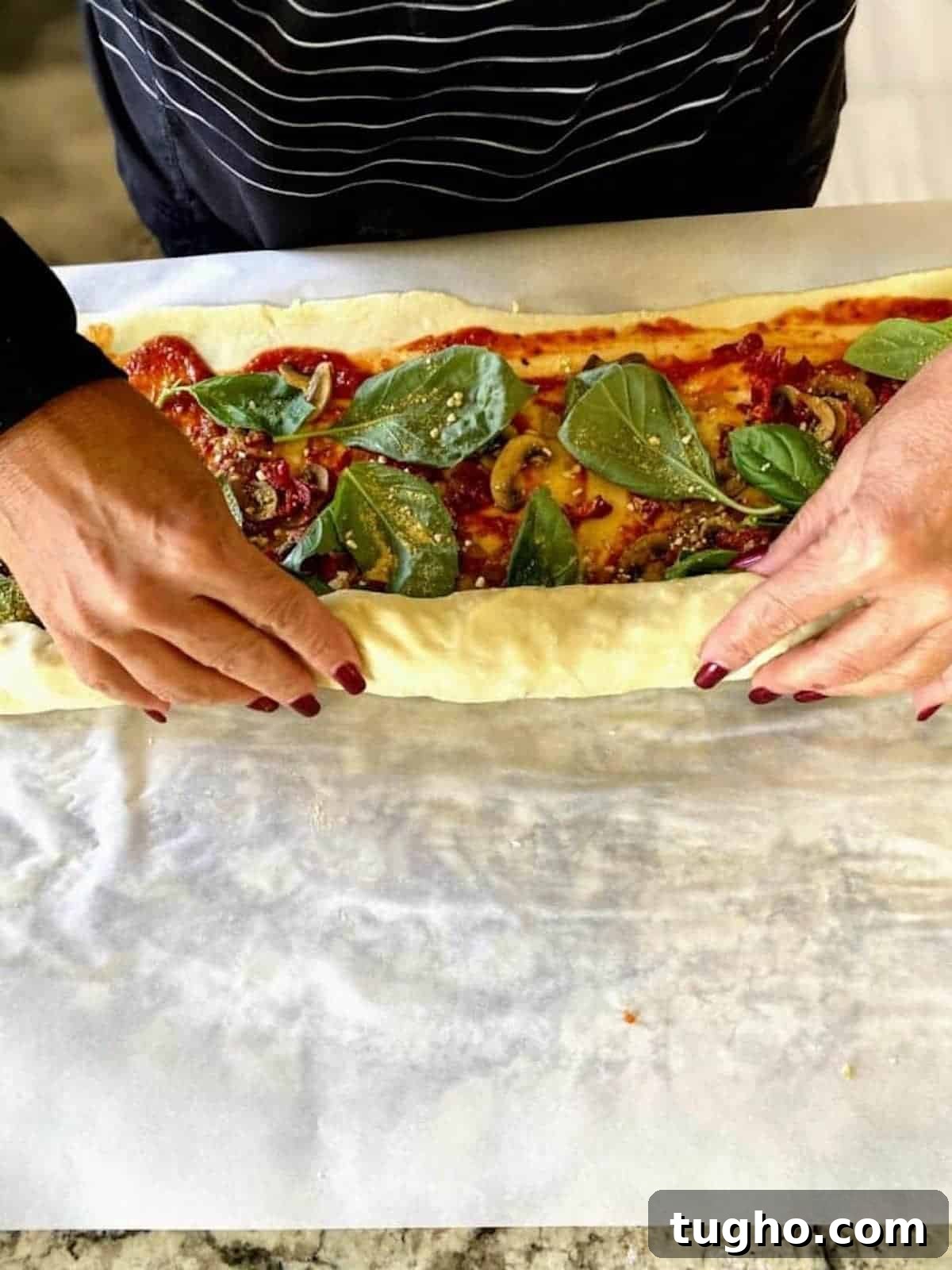 Vegan Pizza Pinwheels Recipe for Party Snacks 2 I am rolling the vegan pizza pinwheels.