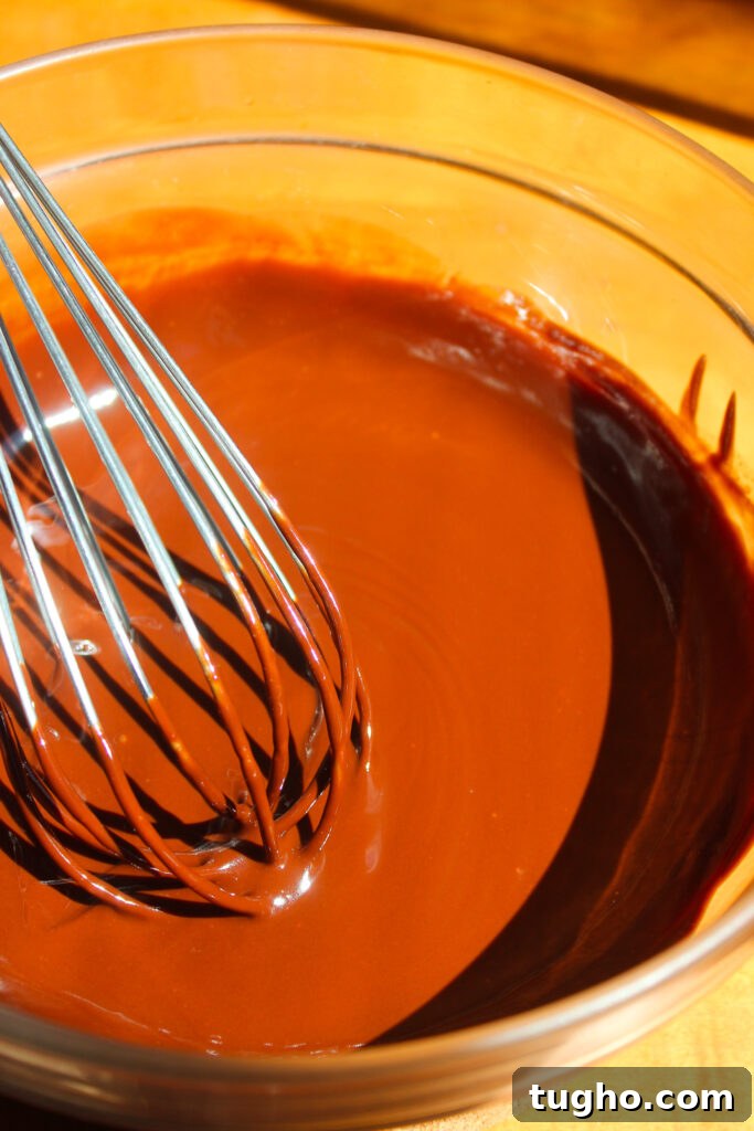 Fudgy Nutella Brownies Recipe for Gooey Chocolate Lovers 4 Melting chocolate
