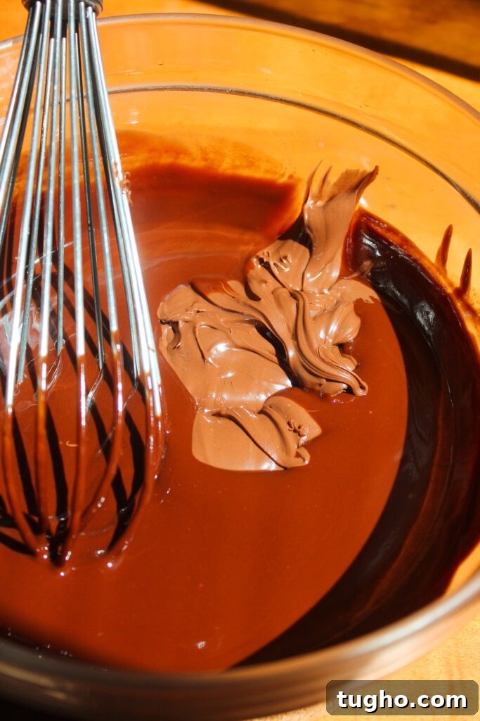 Fudgy Nutella Brownies Recipe for Gooey Chocolate Lovers 5 Adding Nutella