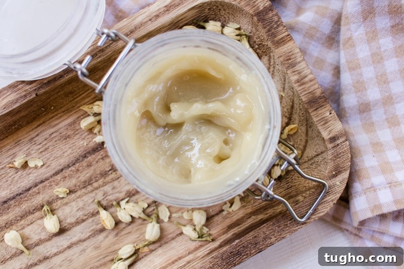 A jar of curl enhancing cream