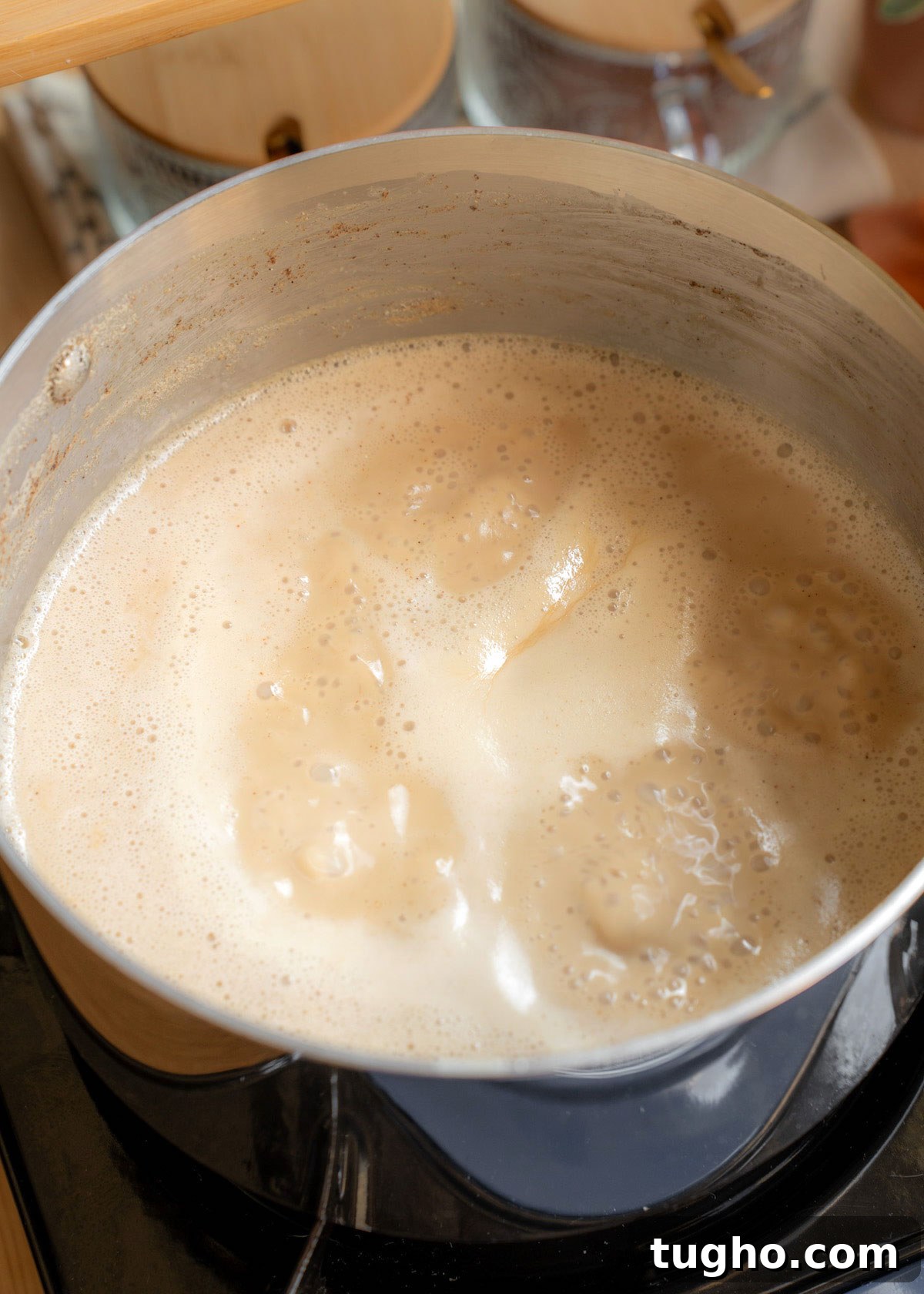 Cajeta: Authentic Mexican Goat Milk Caramel Recipe 6 cajeta gently simmering