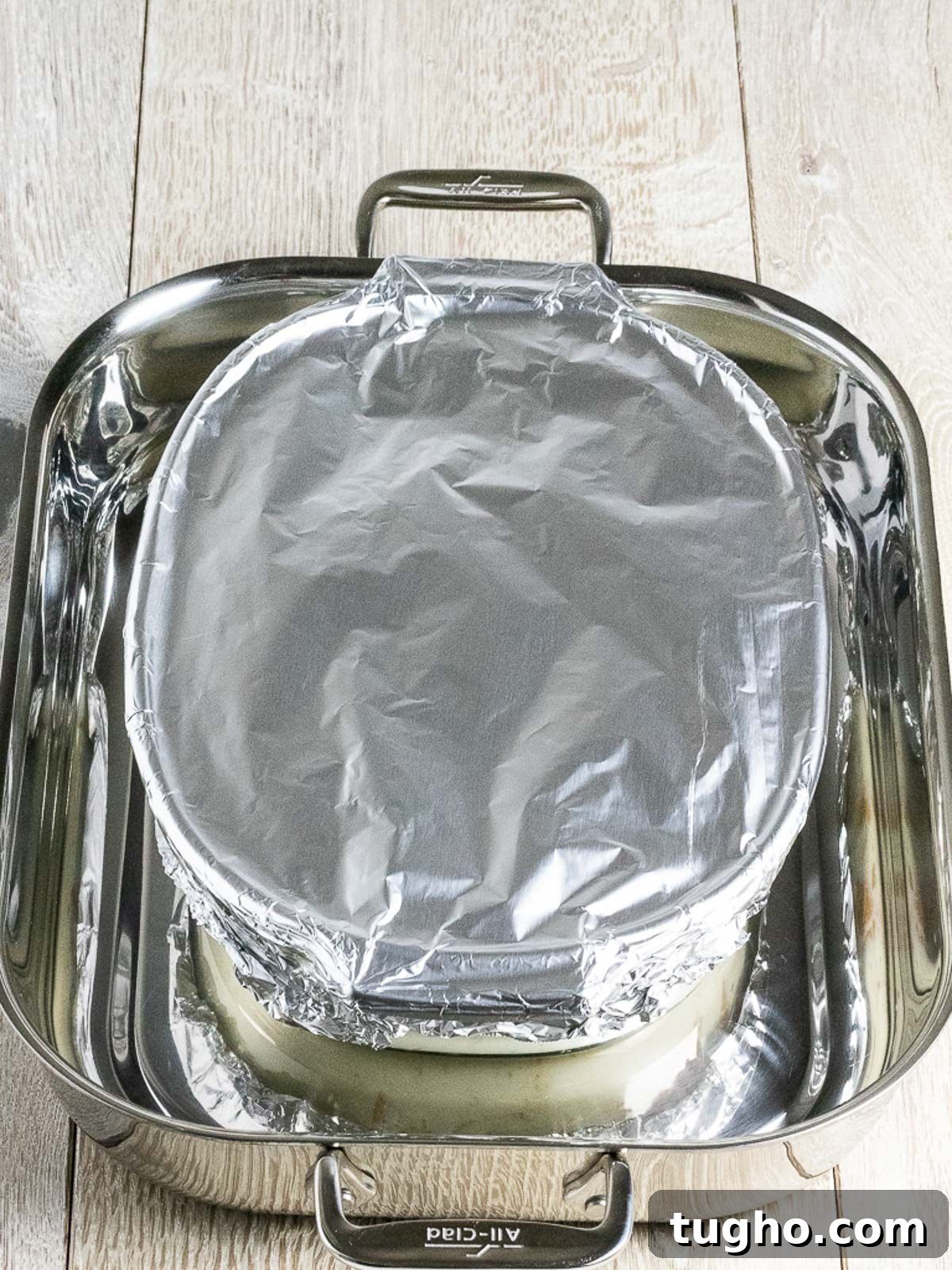 Custard bread pudding in a water bath.