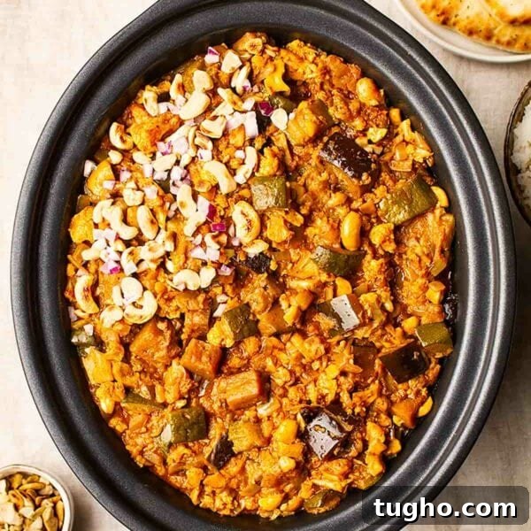 Slow Cooker Chana Saag: Chickpea Curry with Spinach 10 Vegetarian slow cooker curry in a slow cooker topped with cashew nuts.