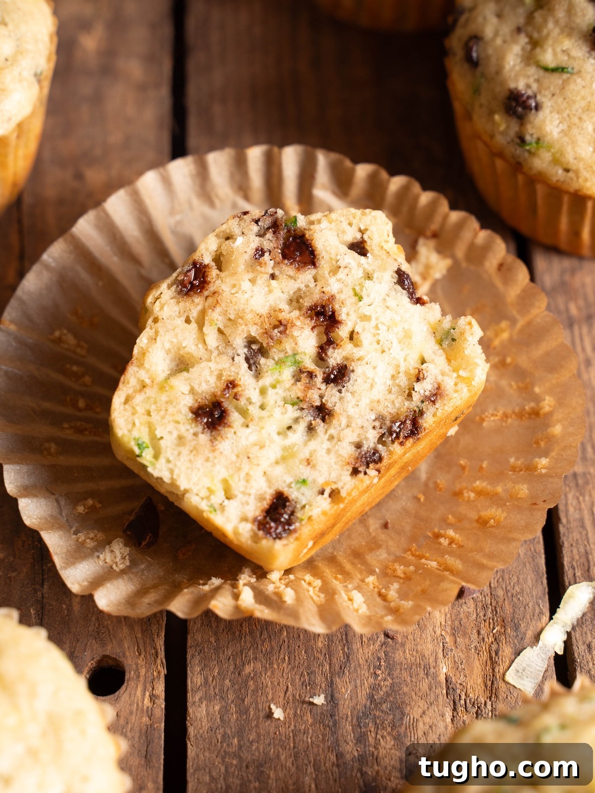 Sourdough zucchini chocolate chip muffin, split in half