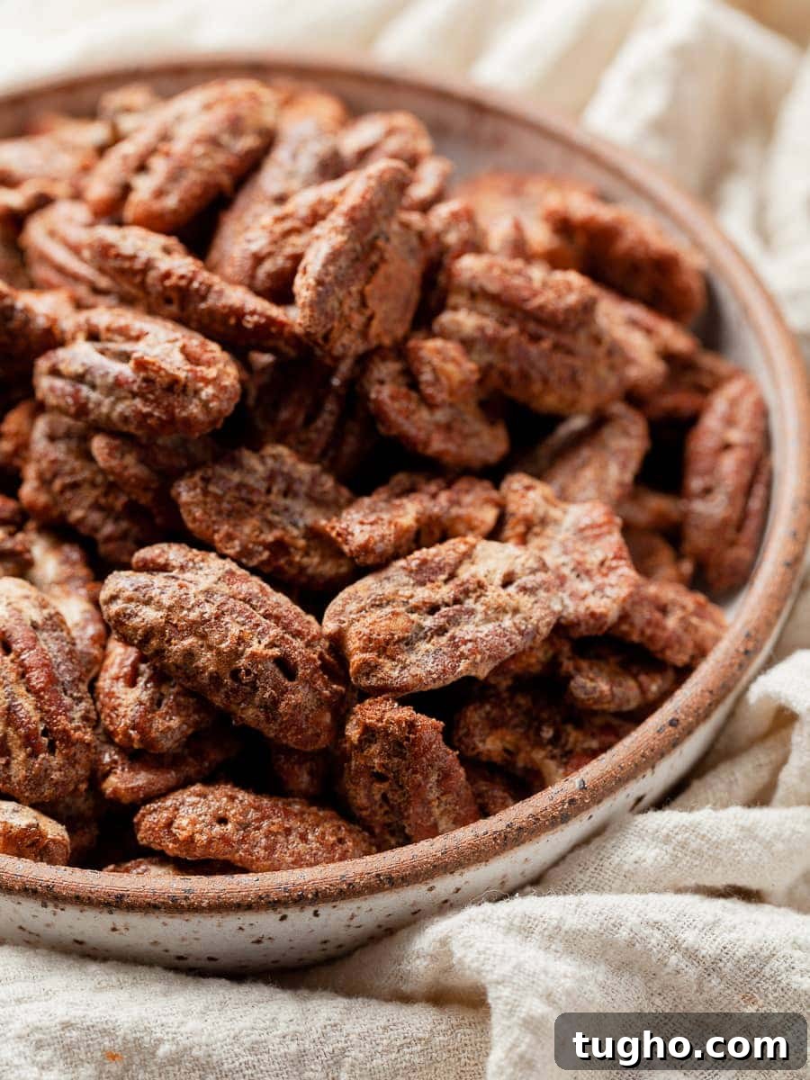 Cinnamon-Spiced Gluten-Free Pecans Recipe 2 a bowl of gluten free cinnamon spiced pecans