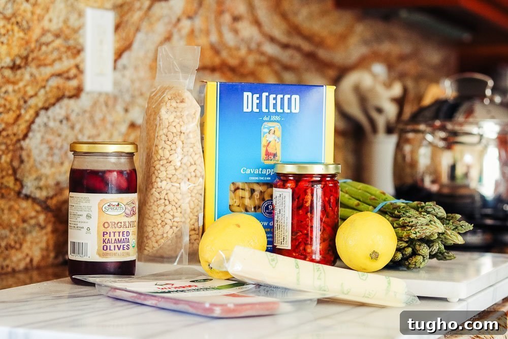Mediterranean Pasta Salad with Feta, Olives, Sun-Dried Tomatoes 7 ingredients on counter