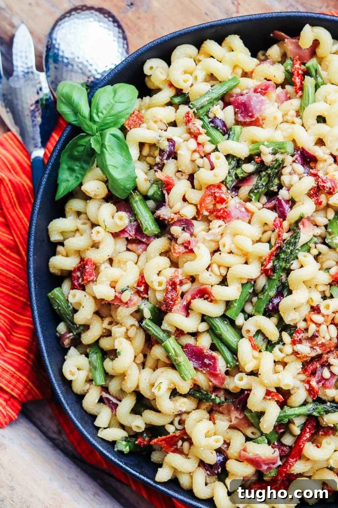 Mediterranean Pasta Salad with Feta, Olives, Sun-Dried Tomatoes 8 pasta salad in bowl