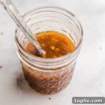 A mason jar with tamari sauce.