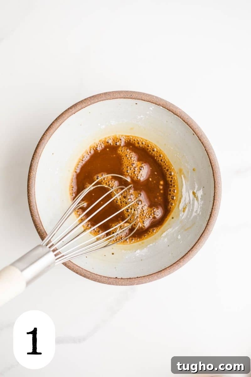 Homemade Gluten-Free Stir-Fry Sauce Recipe 4 A bowl with tamari and arrowroot starch.