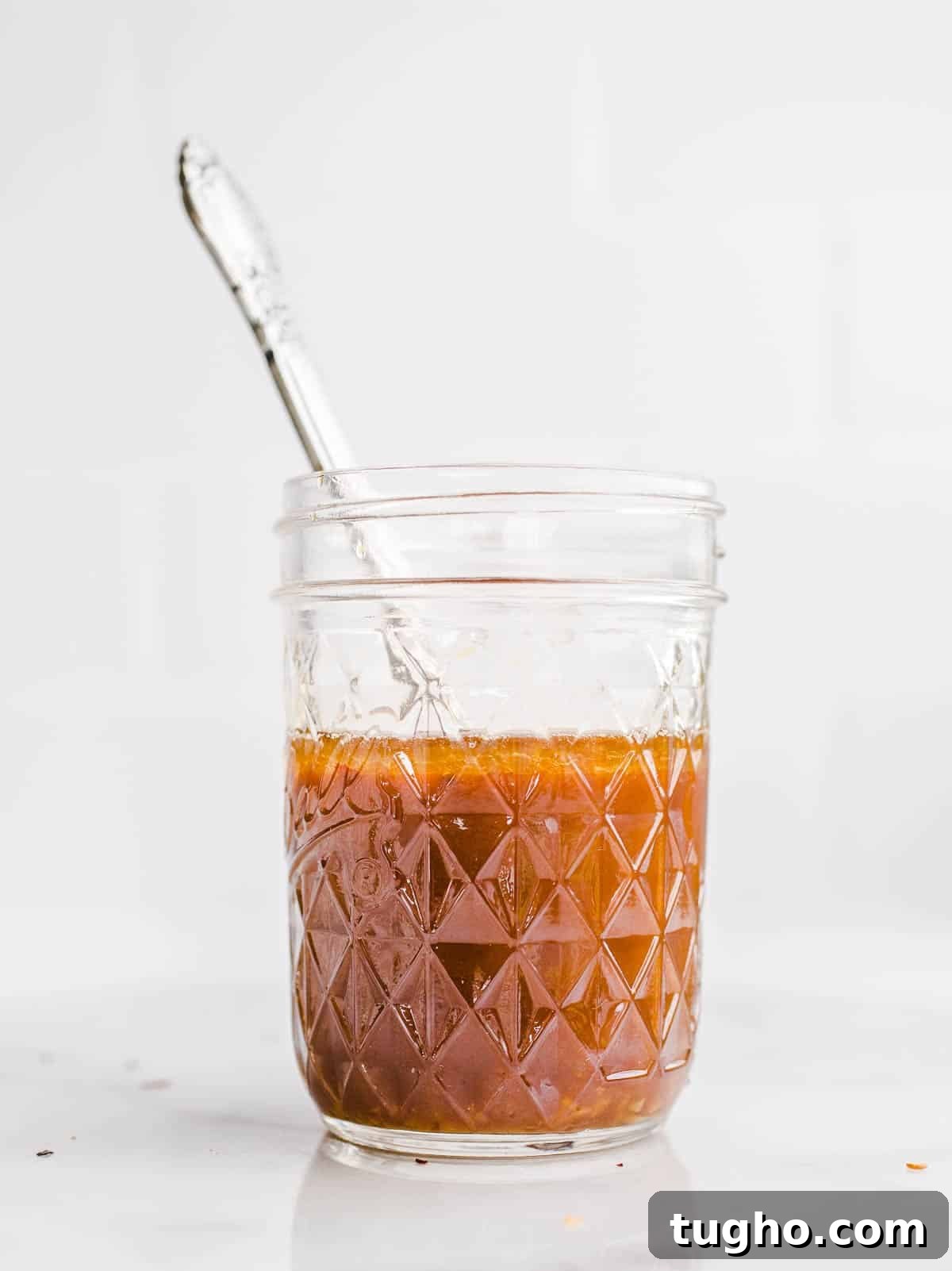 Homemade Gluten-Free Stir-Fry Sauce Recipe 6 Spiced tamari in a small mason jar.