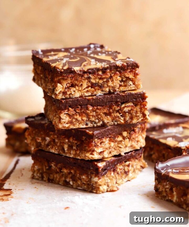 no bake chocolate tahini date oat bars stacked