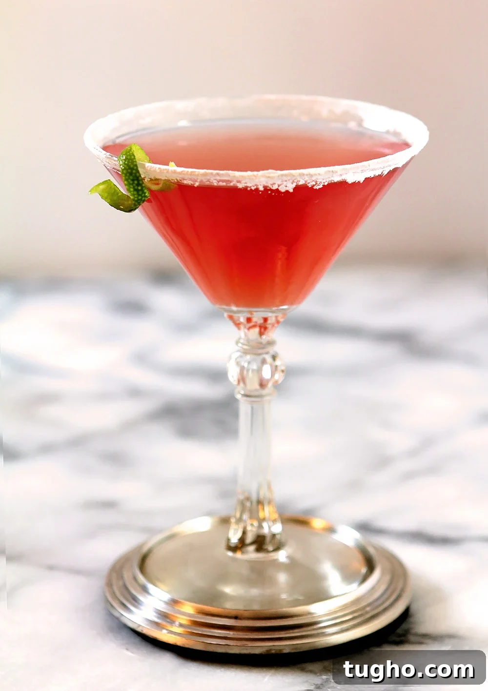 Classic Cosmopolitan Cocktail Recipe 5 Cosmopolitan Pink Cocktail on Marble Table with Lime Garnish