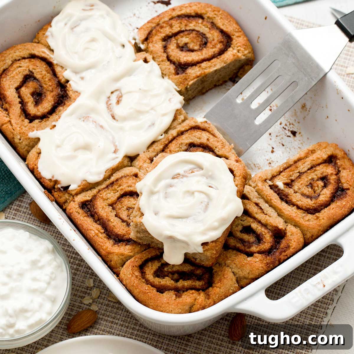 Gingerbread Overnight Oats with High-Protein Greek Yogurt 11 A baking dish with a batch of cottage cheese cinnamon rolls made gluten-free with oat and almond flour.