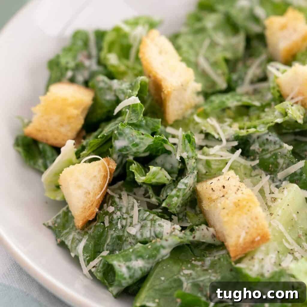 15 Delicious Side Dishes to Pair with Pasta 4 caesar salad in white bowl