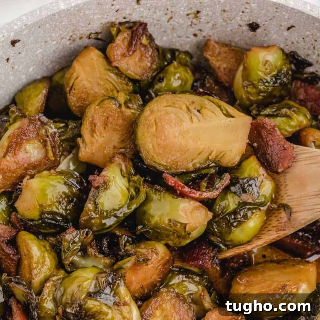 15 Delicious Side Dishes to Pair with Pasta 6 close up of brown sugar bacon brussels sprouts and wooden spoon