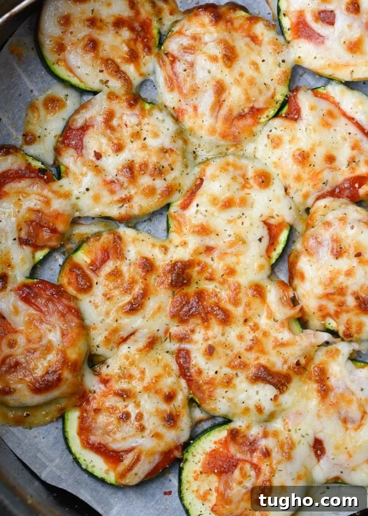 Air Fryer Zucchini Pizza Bites with marinara and mozzarella cheese