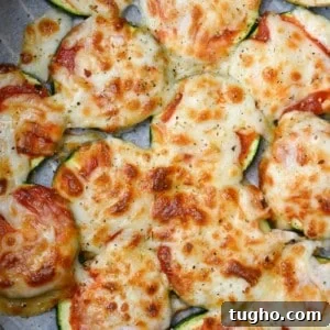 Air Fryer Zucchini Pizza Bites with melted mozzarella