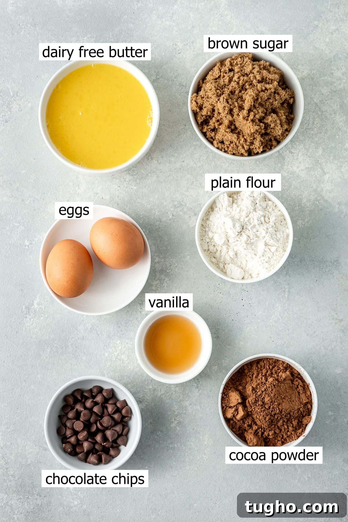 Fudgy Dairy-Free Chocolate Brownies 3 All ingredients needed to make dairy free chocolate brownies laid out in small bowls.