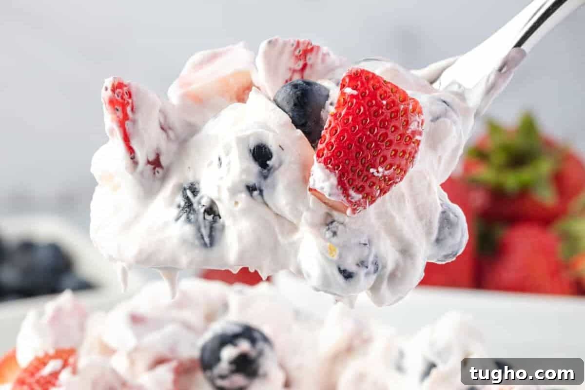 Patriotic Red, White and Blue Cheesecake Salad Recipe 3 cheesecake fruit salad filled with blueberries and strawberries