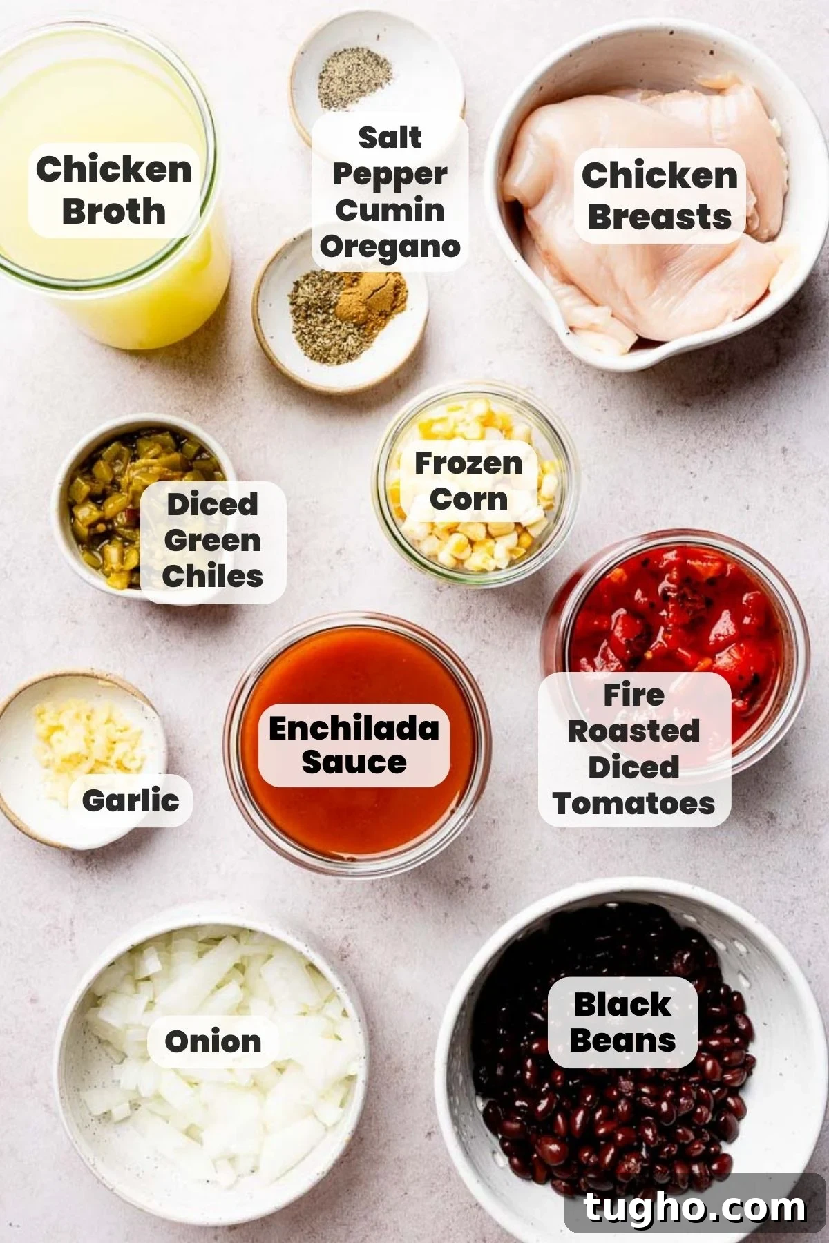 Slow Cooker Chicken Tortilla Soup Recipe 3 Ingredients including enchilada sauce, tomatoes, black beans, and chicken, measured out in bowls.