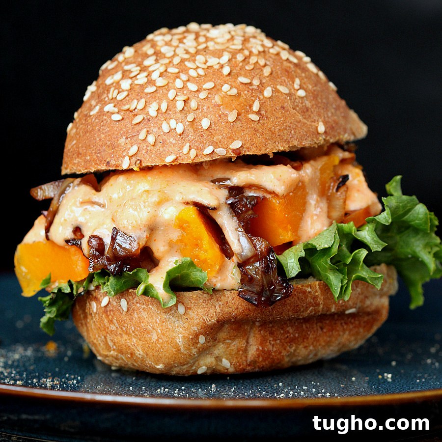 Roasted Butternut squash slider with balsamic caramelized onions and sriracha mayo
