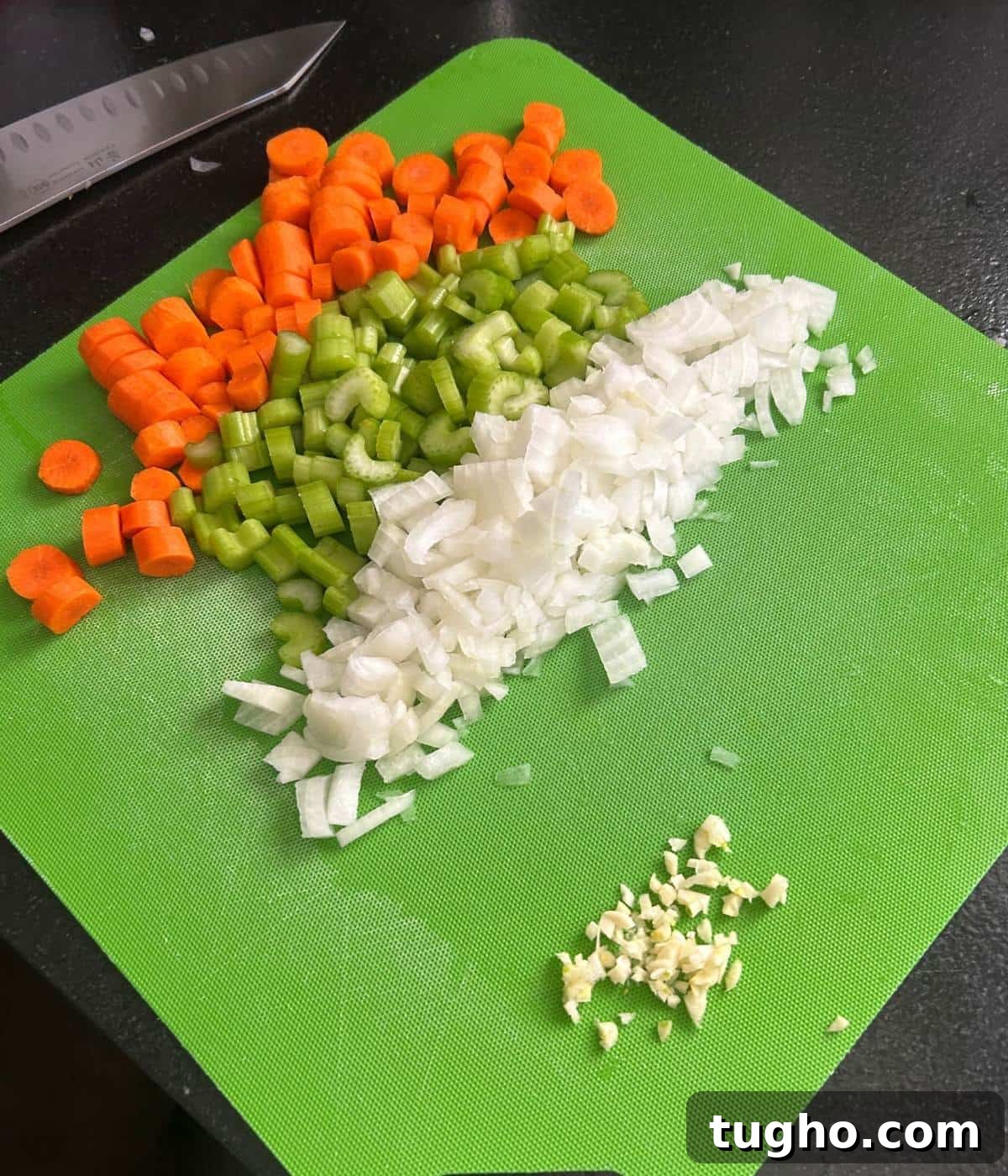 Dutch Oven Beef Stew with Tender Chuck and Vegetables 5 Vegetables for beef stew on cutting mat.