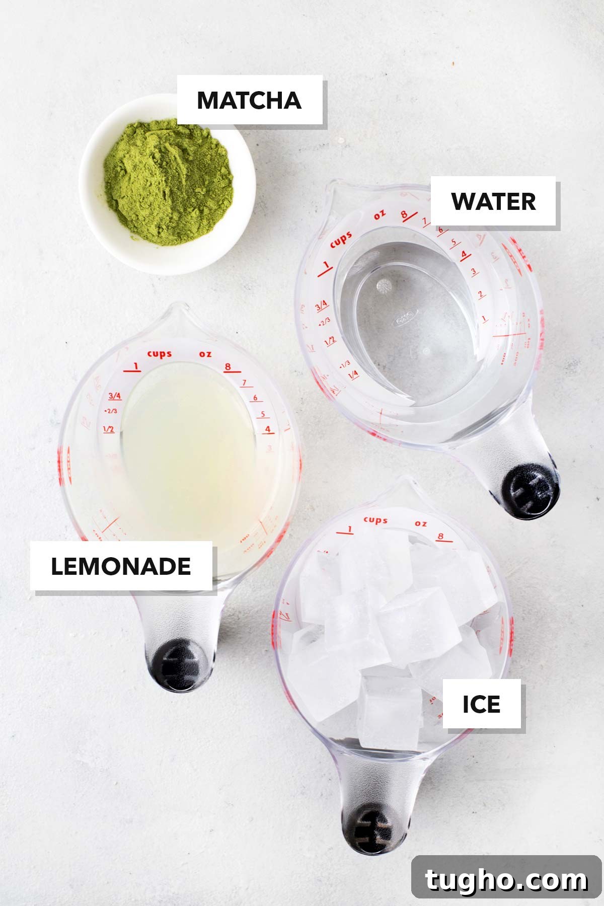 Layered Matcha Lemonade Recipe: Iced Citrus Green Tea 4 Matcha Lemonade ingredients measured in cups and labeled on a table.