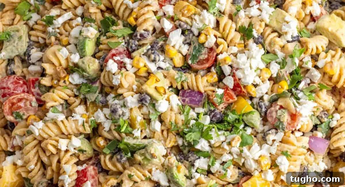 Overhead up close image of Mexican pasta salad. 