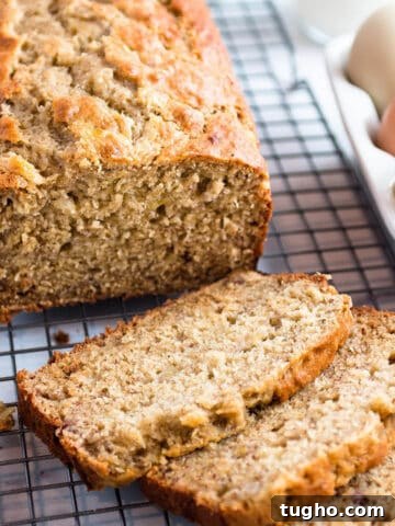 Zesty Sourdough Lemon and Poppy Seed Muffins 9 Loaf of sourdough banana bread on a cooling rack